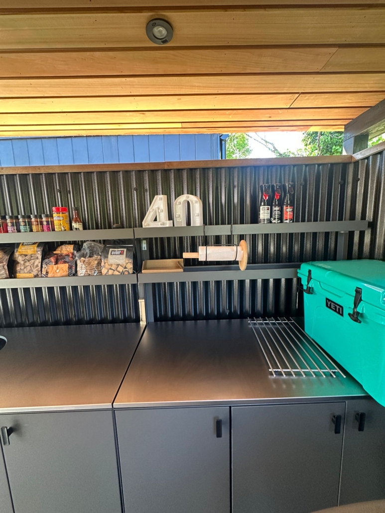 Ikea BÅTSKÄR outdoor kitchen units with corrugated heat proof walls